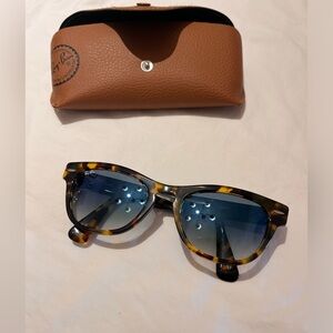 Ray Ban Laramie Havana with blue gradient lenses.